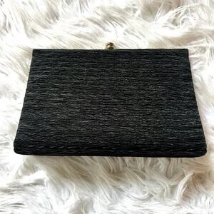 Textured black clutch
